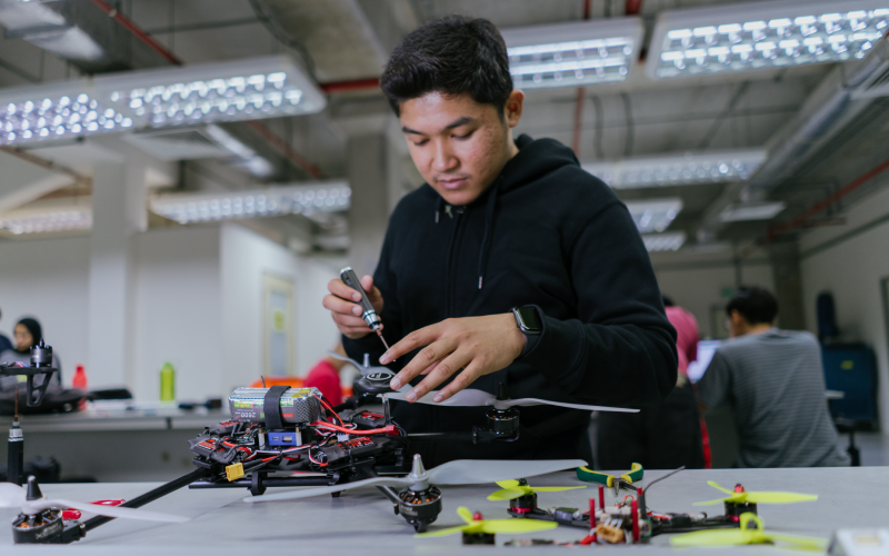 student screwing stuff