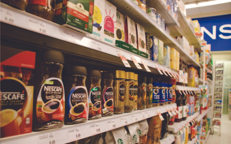 Rows of coffee granules in a hypermarket