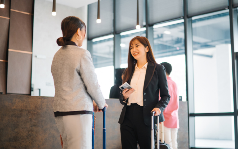 Businesswomen talking in a hotel lobby