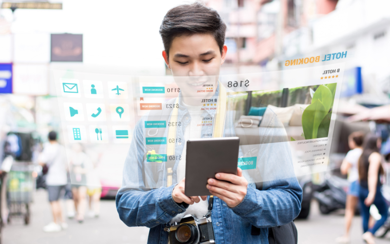 Tourist using application to book a hotel