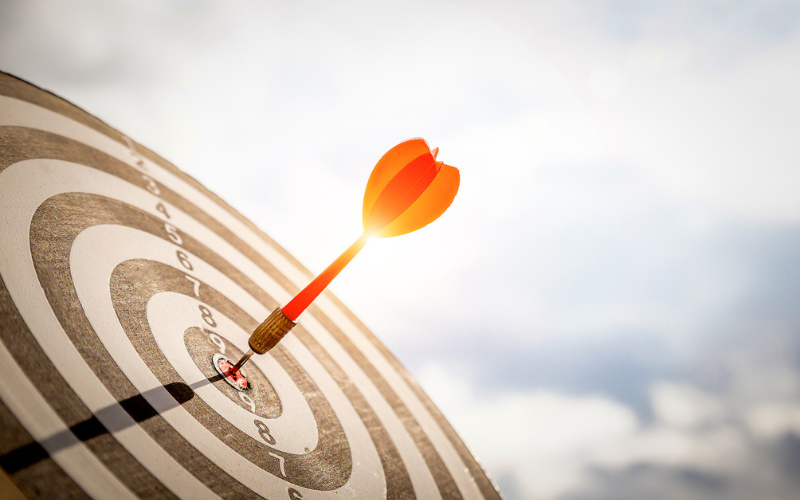 an arrow hitting the bulleye