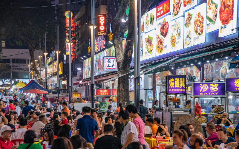 Photograph capturing the vibrant atmosphere of a Malaysian night market