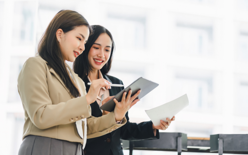Two businesswomen working together
