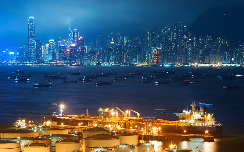 Oil Storage tanks with urban background in Hong Kong