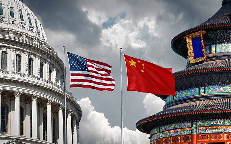 US and Chinese national symbols: The Capitol in Washington DC and Temple of Heaven in Beijing with national flags