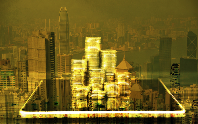 coins stacked on top of an ipad