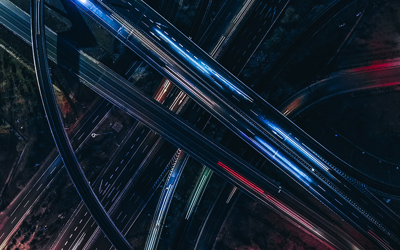 Drone Point View of Overpass and City Traffic at Night / Beijing, China
