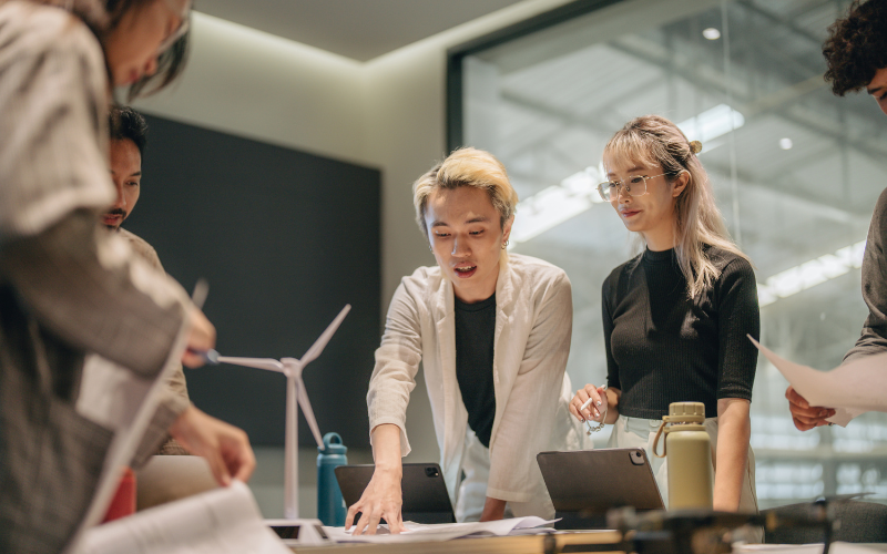 Action shot of young leaders having discussion for business project