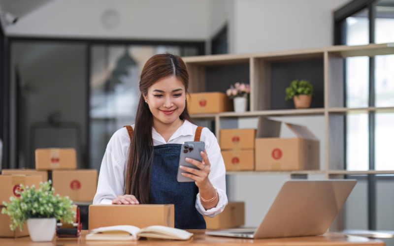Business entrepreneur using a phone