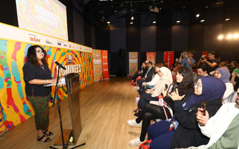 woman giving a speech on stage