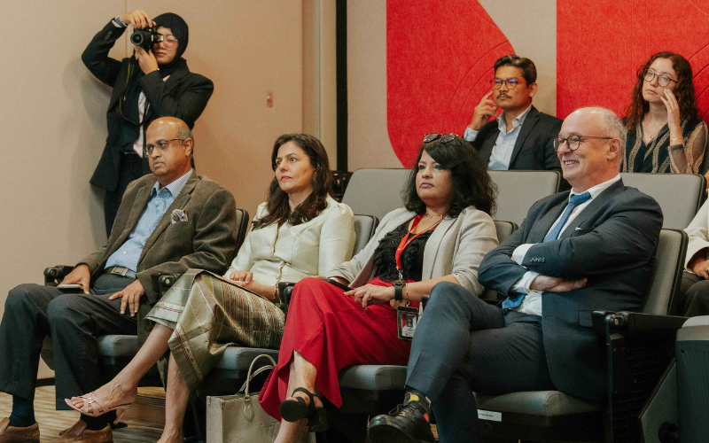 professionals seated in a lecture theater