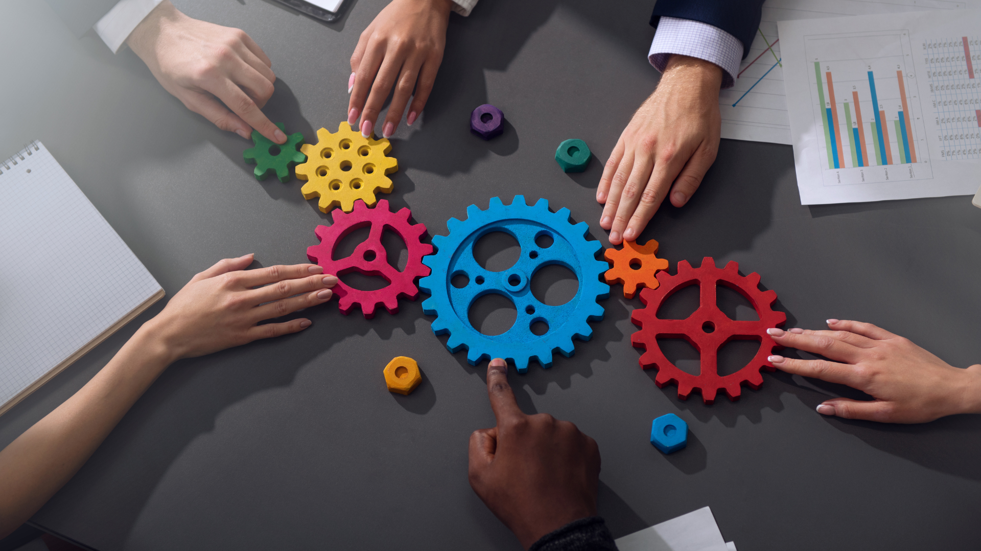 gears moving by hand on a table