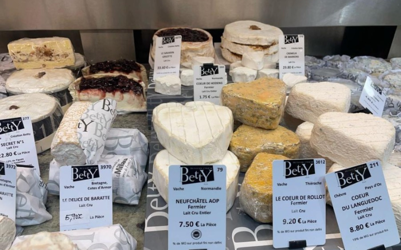 types of cheese on display