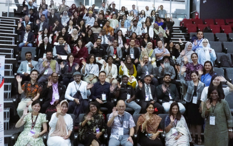 all participants seated in a lecture hall