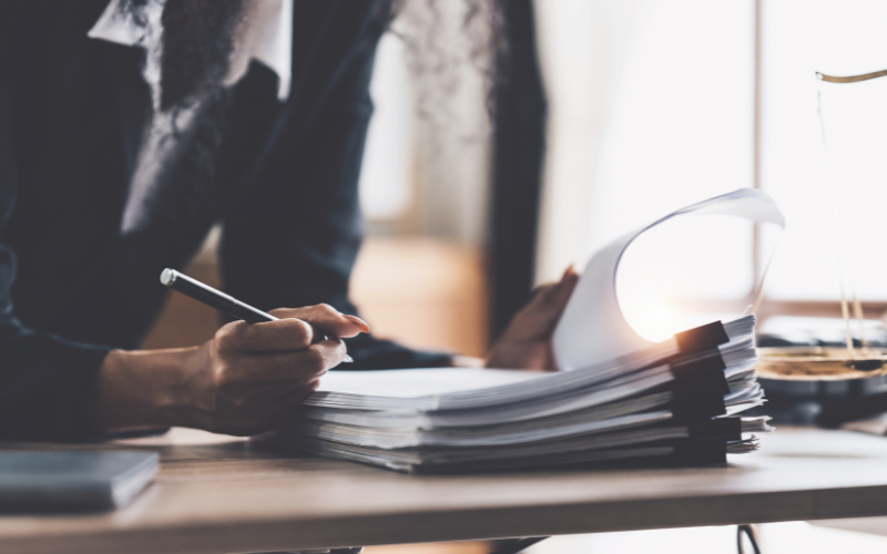 individual signing some paperwork