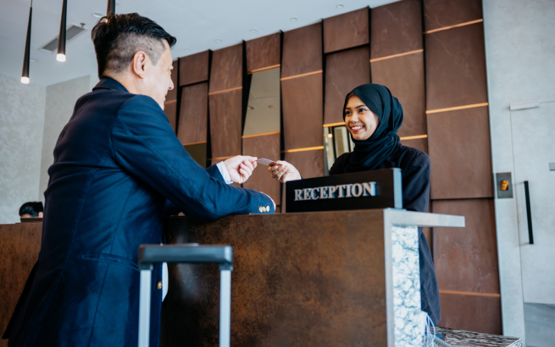 receptionist with a customer