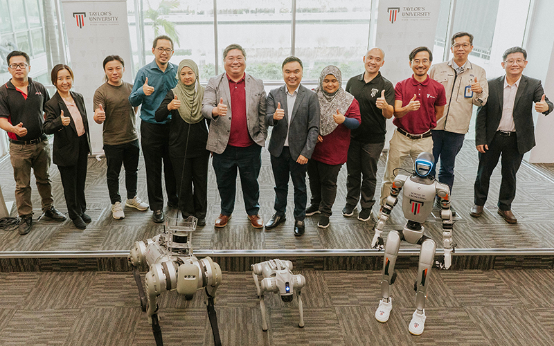 Industry partners, Advance Retro Solution (ARS) Sdn Bhd first from left, Alphaswift Industries Sdn Bhd third from left, Controller Area Network Solutions Malaysia Sdn Bhd first from right, and Hirose Electric Malaysia Sdn Bhd second from right, together with Mechatronics programme academics commemorate the launch in a group photo.