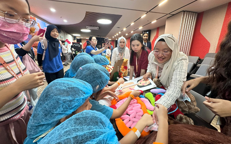 participants giving away stuffed toys