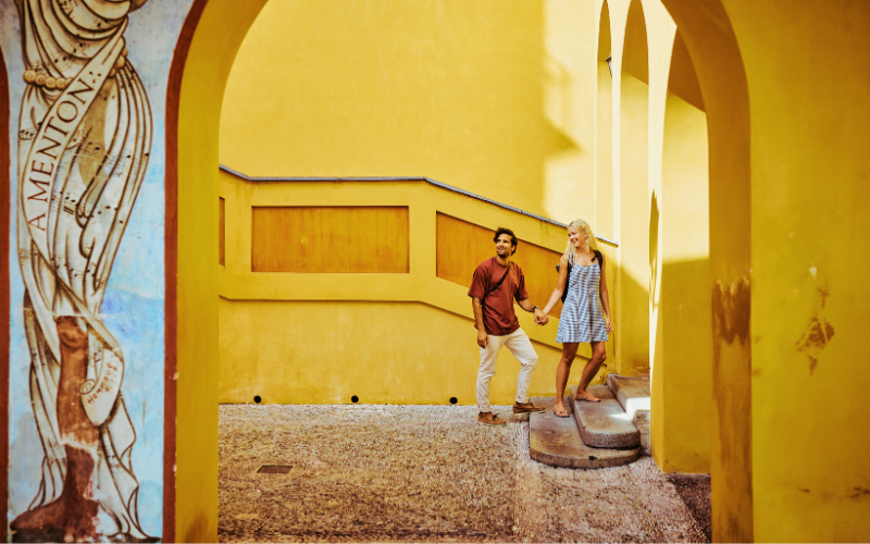 A couple exploring a historic site on foot