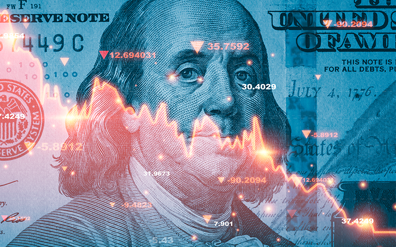 Benjamin Franklin face on USD dollar banknote with red decreasing stock market graph chart for symbol of economic recession crisis concept.