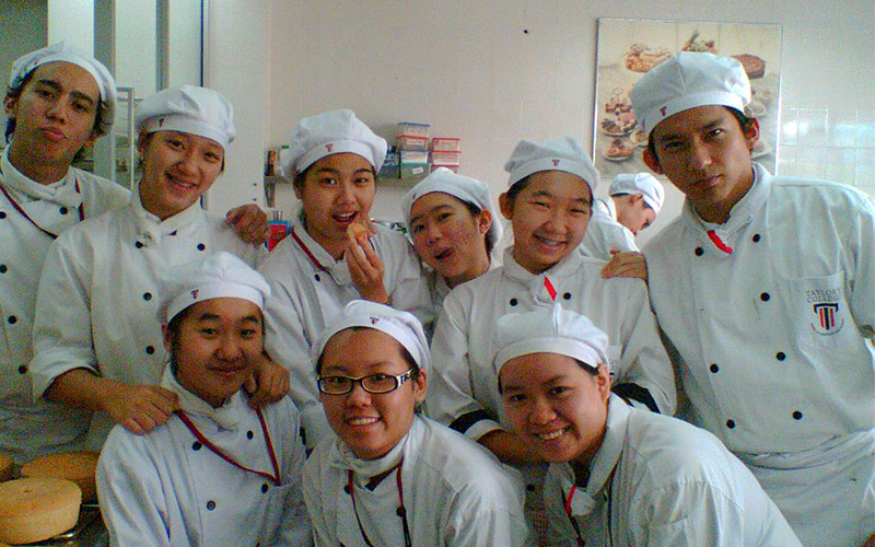 Chef Yuda Bustara (top row, left) with friends during a pastry class at Taylor’s.