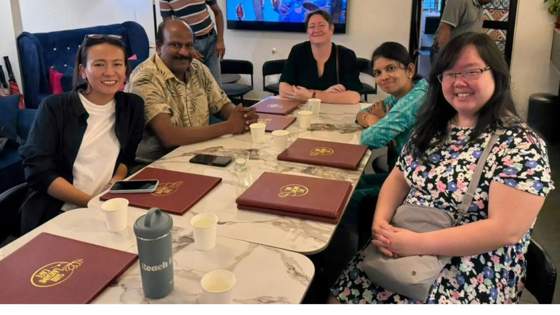 Students and lecturers gathered at Shri Lakshmi Cafe