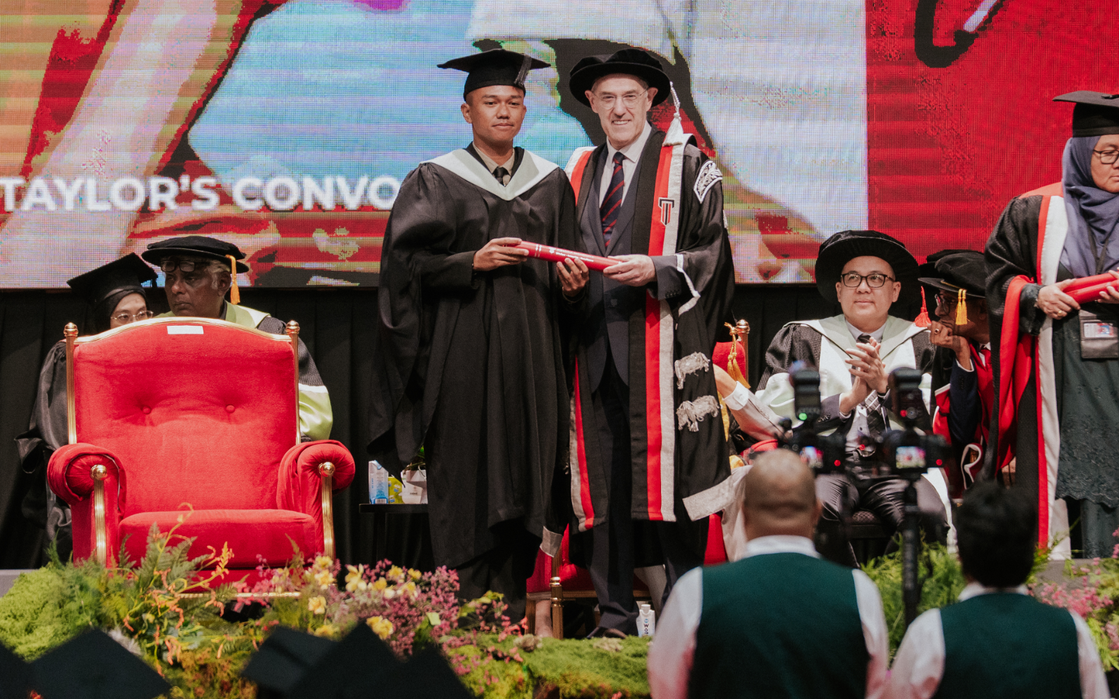 Taylor's University Vice-Chancellor Professor Barry Winn and graduate