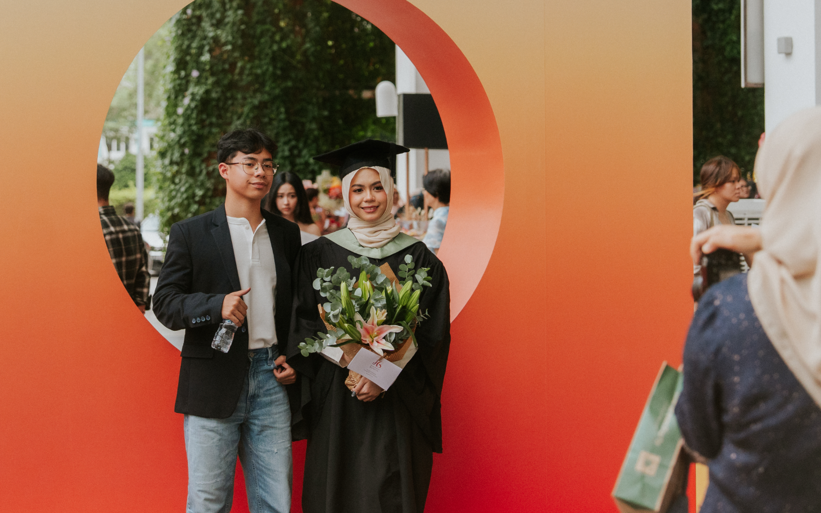 Taylor's graduate and her brother