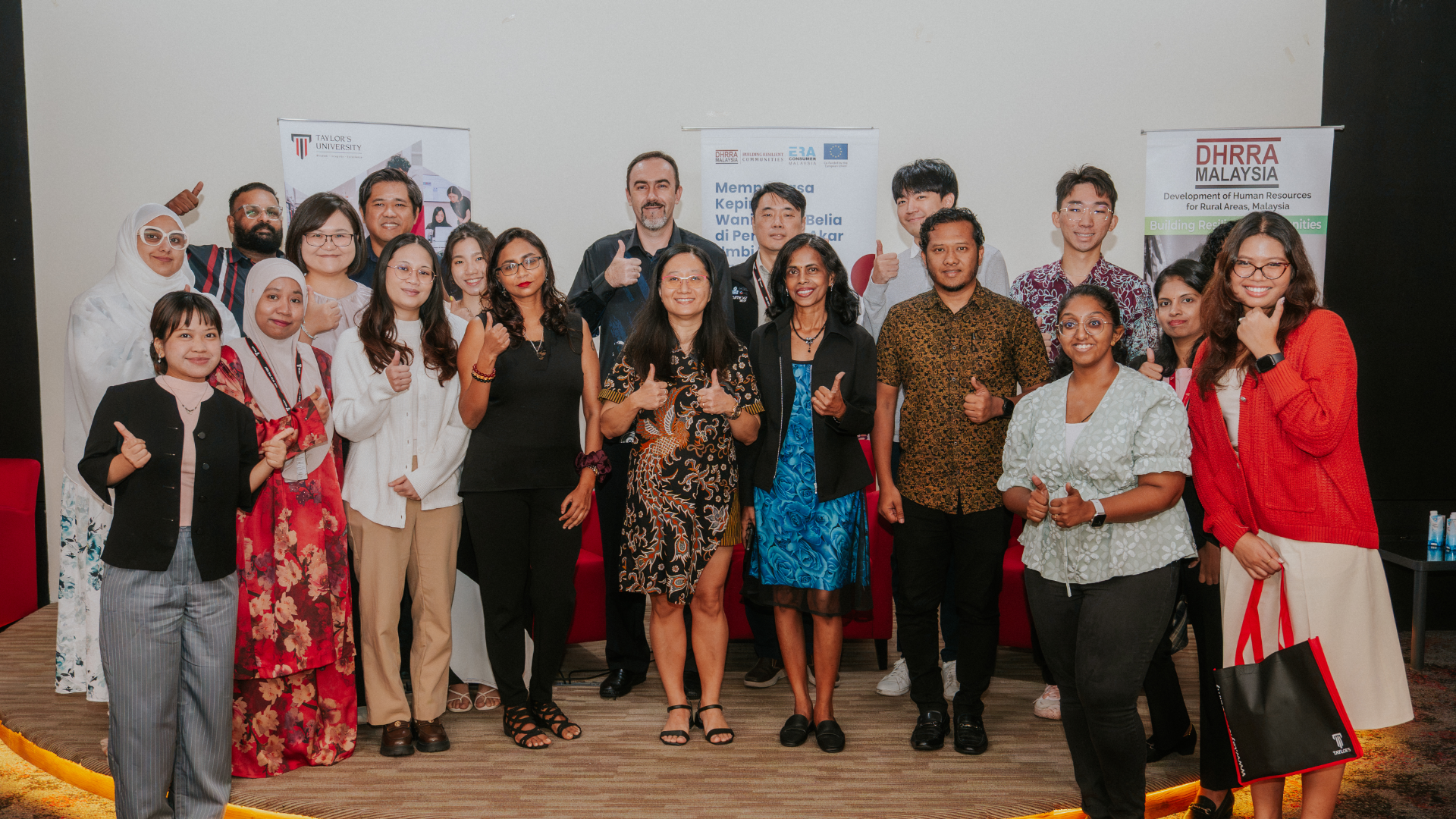 Speakers, organisers and participants of the Our Voice, Our Community programme in a group photo at Taylor's University Lakeside Campus