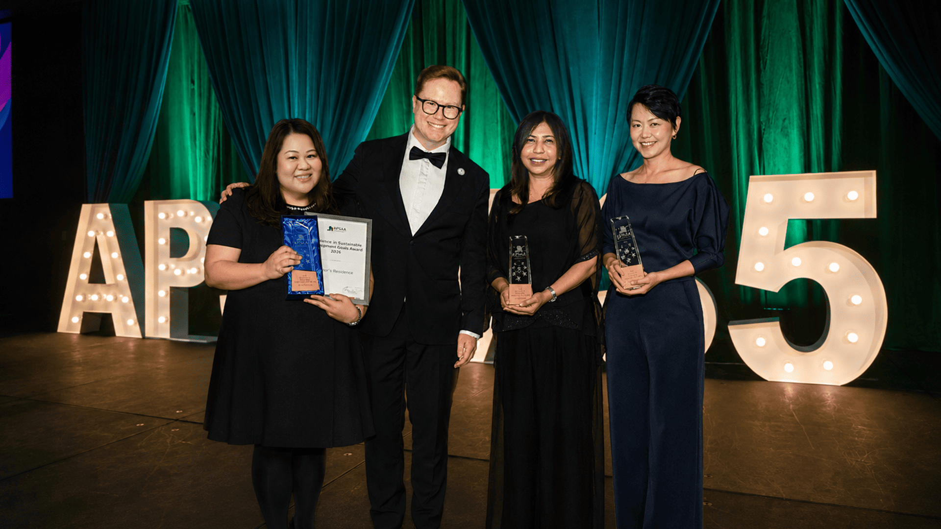 Elaine, Shenna and Renay receiving the awards