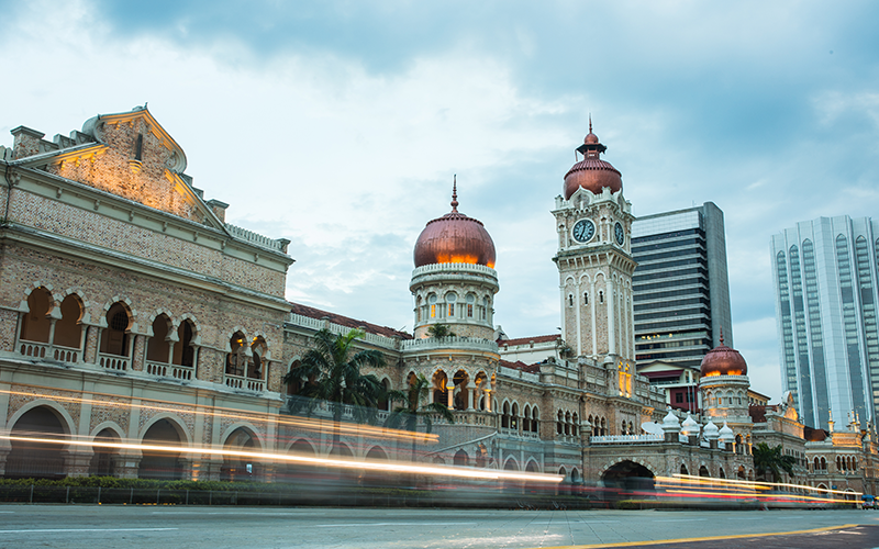 Sultan Abdul Samad Building with street traffic in Kuala Lumpur, Malaysia