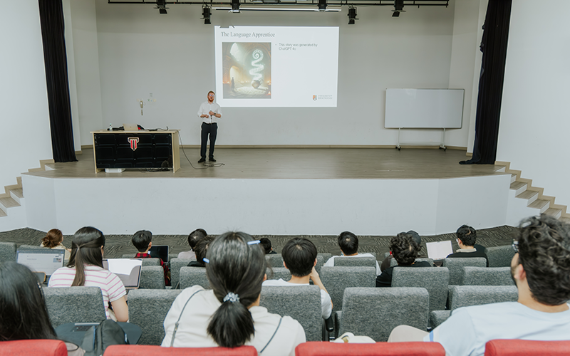 Taylor's lecturer on the stage