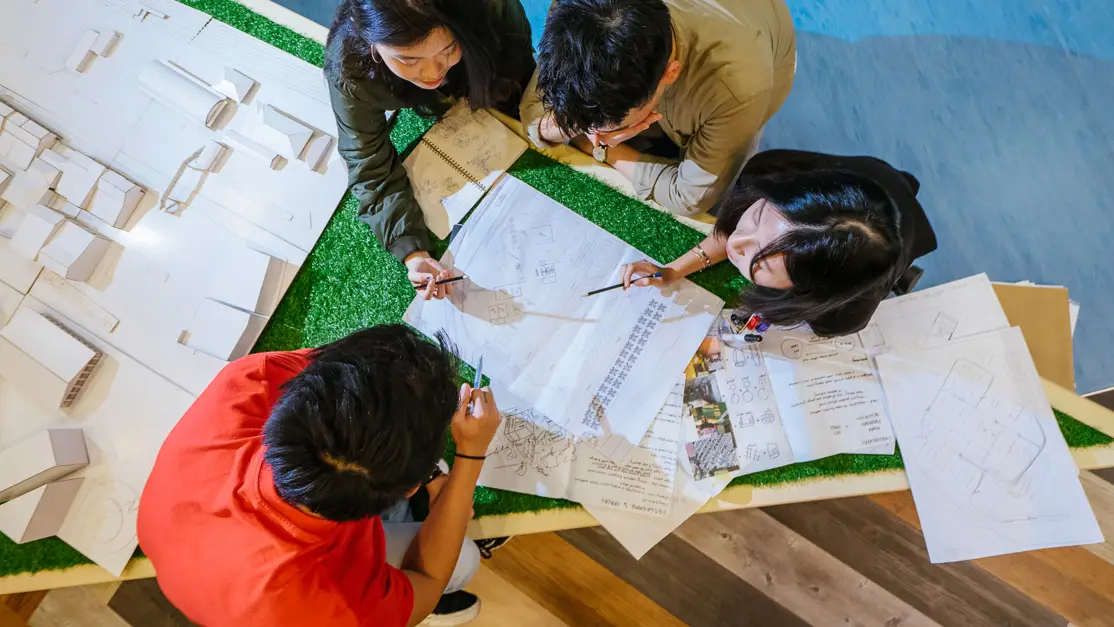 Taylor's architecture students engaging in a group discussion