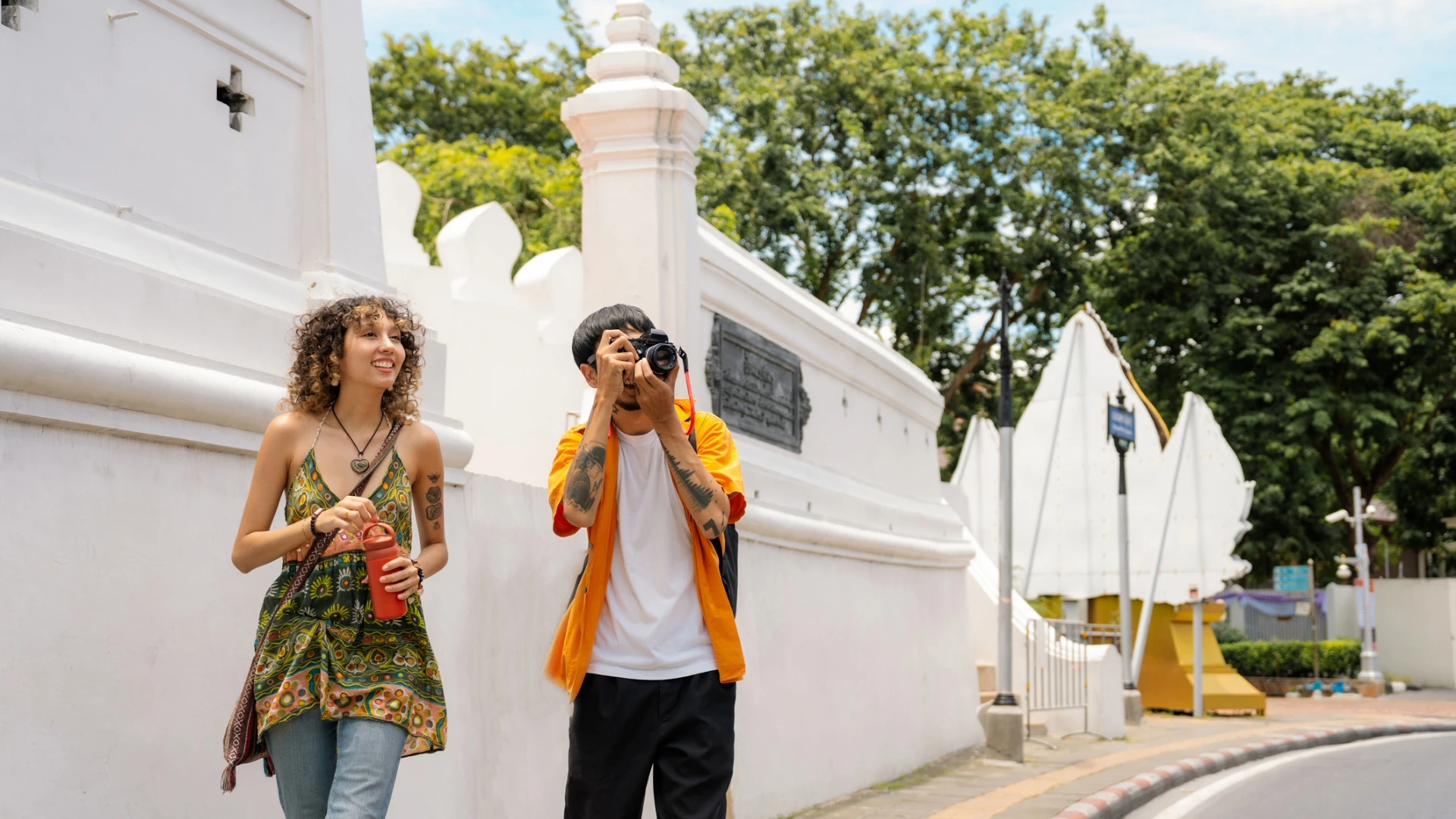 two tourists exploring a tourist hotspot