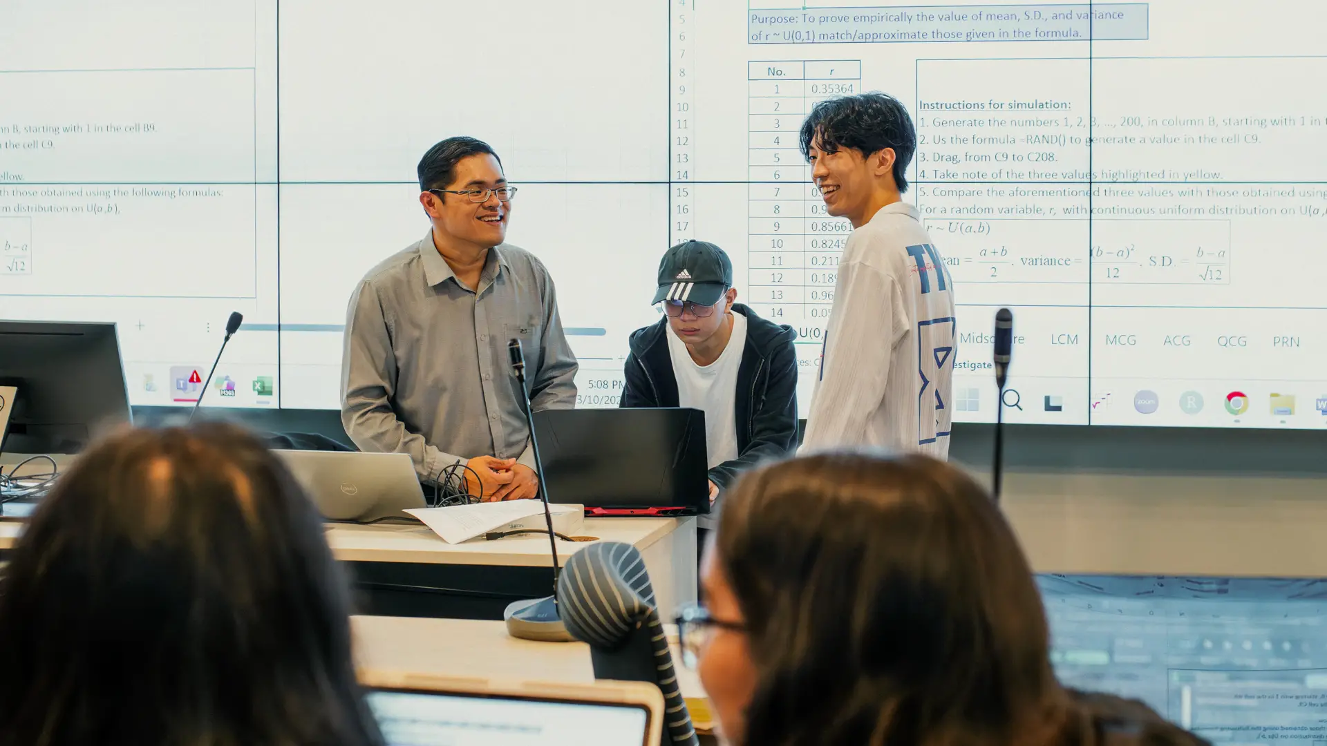 Taylor's lecturer answering questions from the student