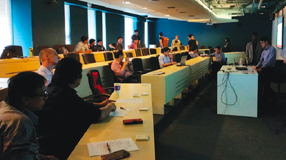 Group of Taylor's School of Computer Science' students presenting final year projects
