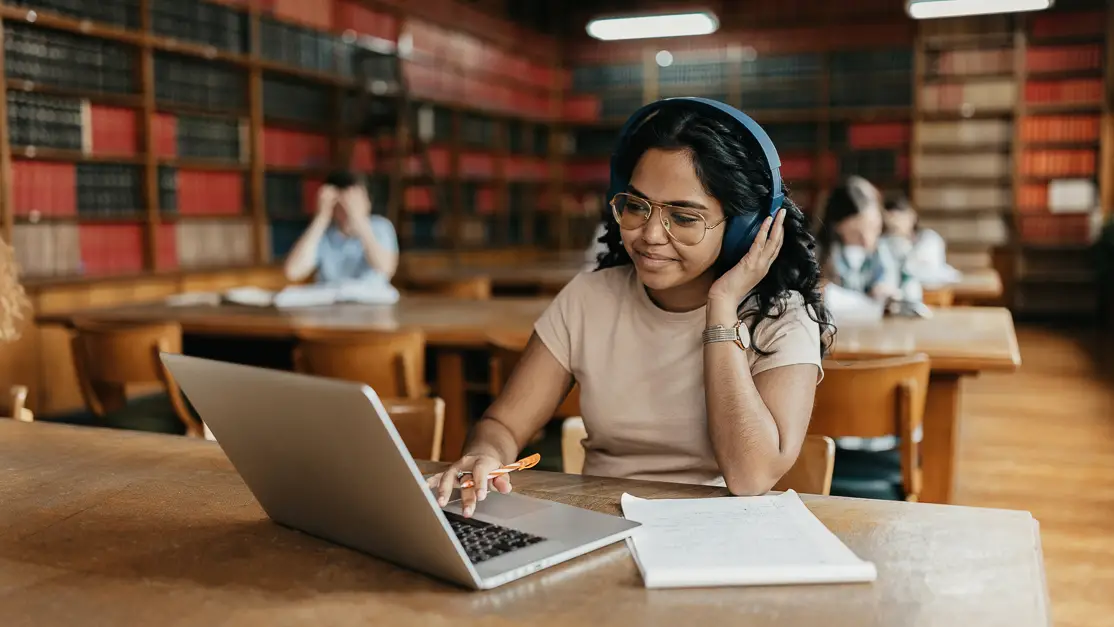 Taylor's computing student revising at the library