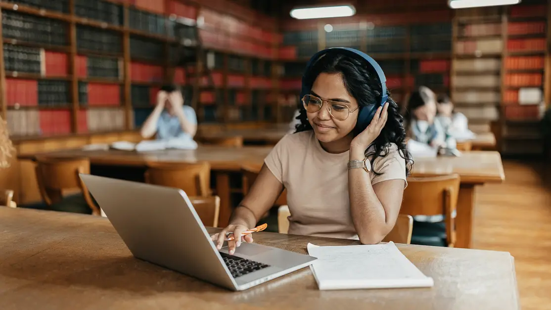 Taylor's computing student revising at the library