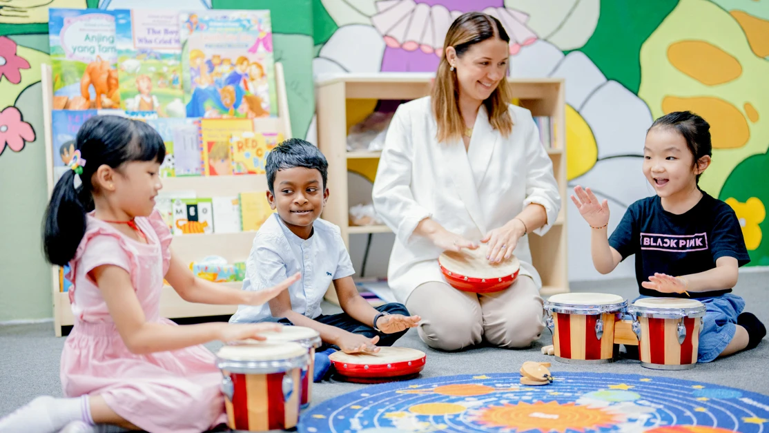 Taylor's education student teaching in a primary school