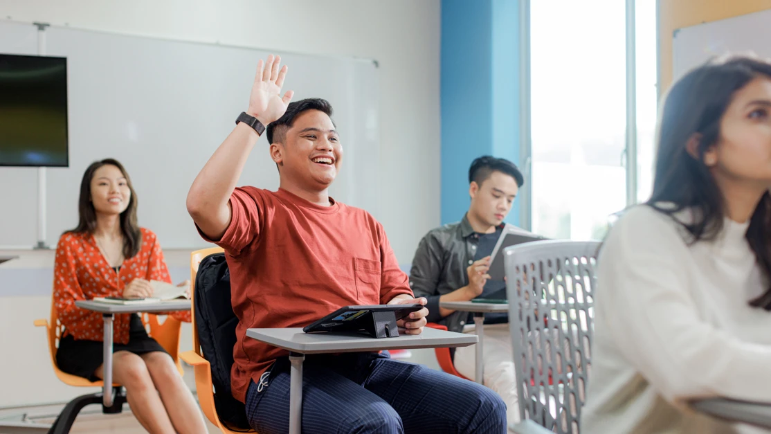 Taylor's education students raising hand to ask questions