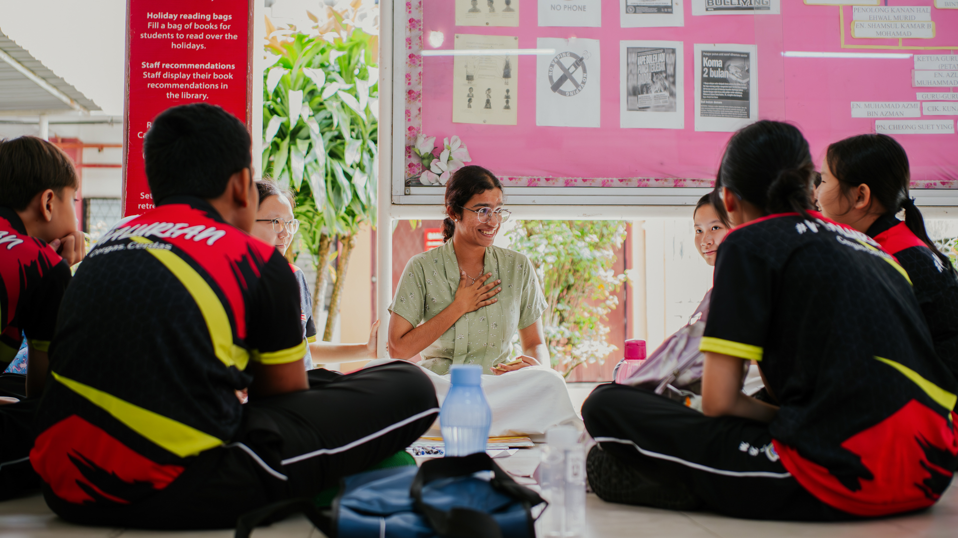 Bachelor of Education students participating in a collaborative classroom discussion with an instructor