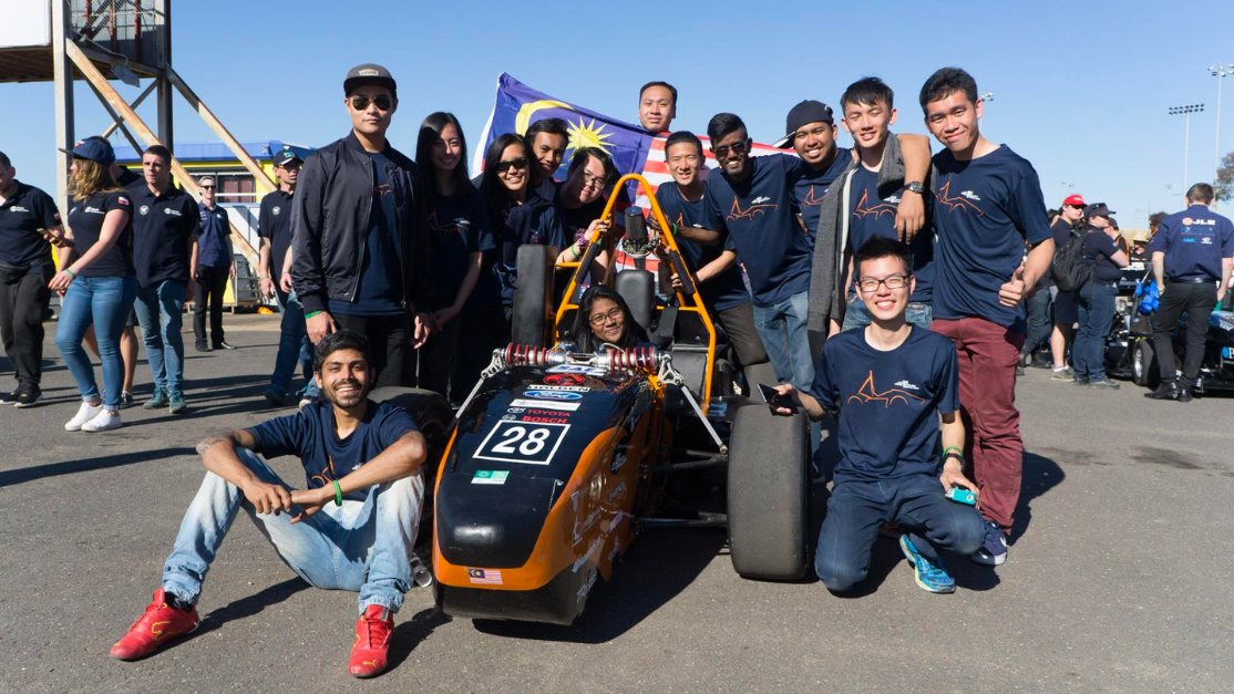 Students with racing car