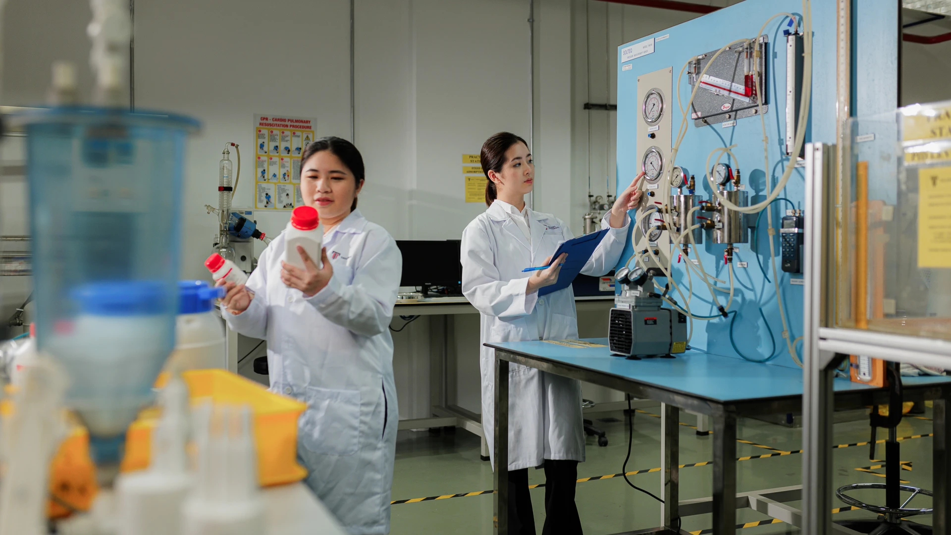 Taylor's Engineering students performing experiments in engineering laboratory