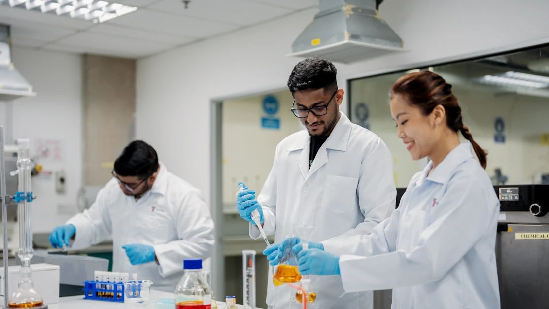Taylor's engineering student performing experiment in the engineering laboratory