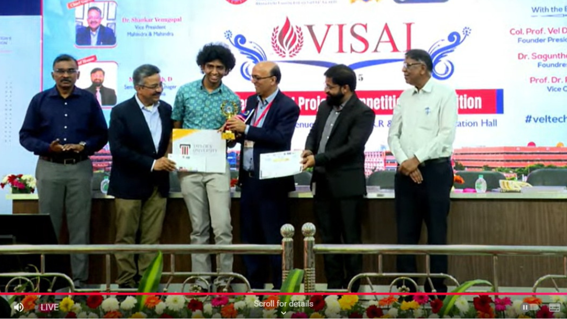 Herish Kovalan winning a prize