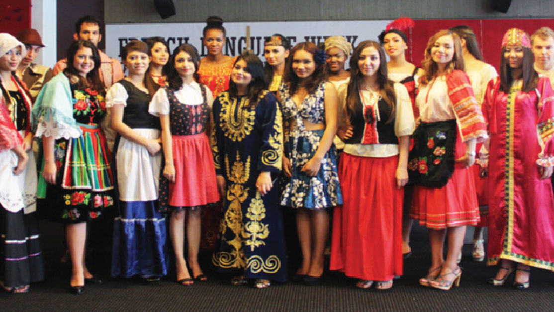 taylor's students in their own respective cultural outfits