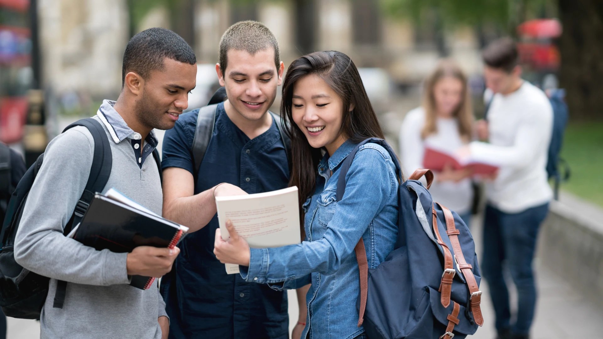 Taylor's student talking to peers from other university