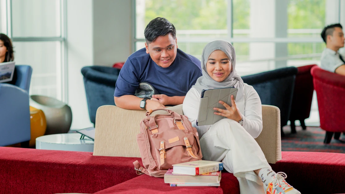 Taylor's law student having discussion in the library