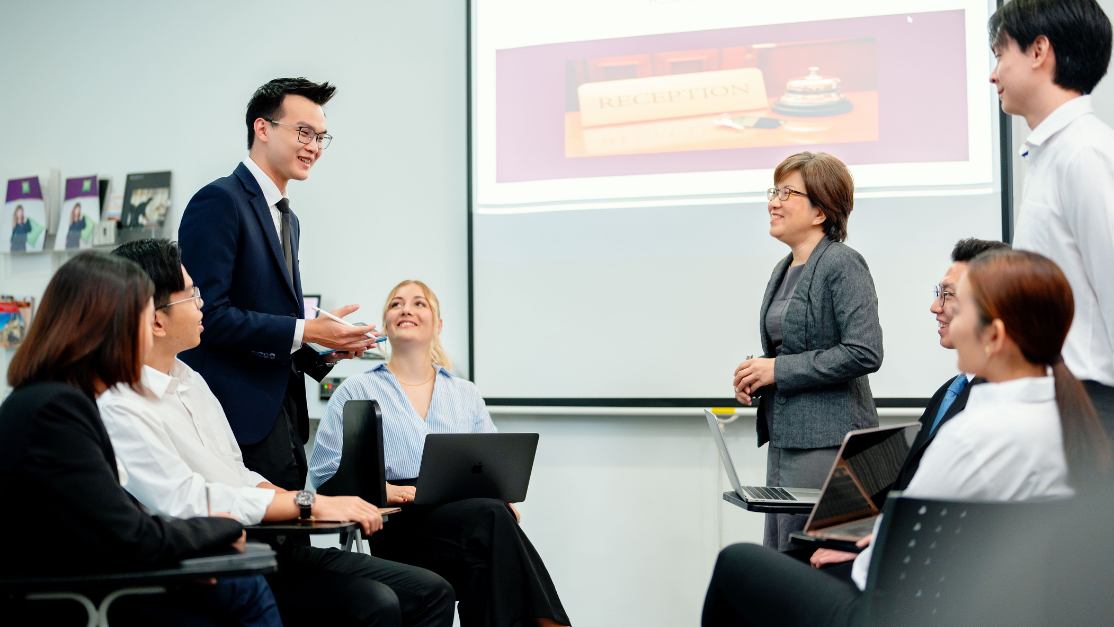 lecturer giving a lecture to his students