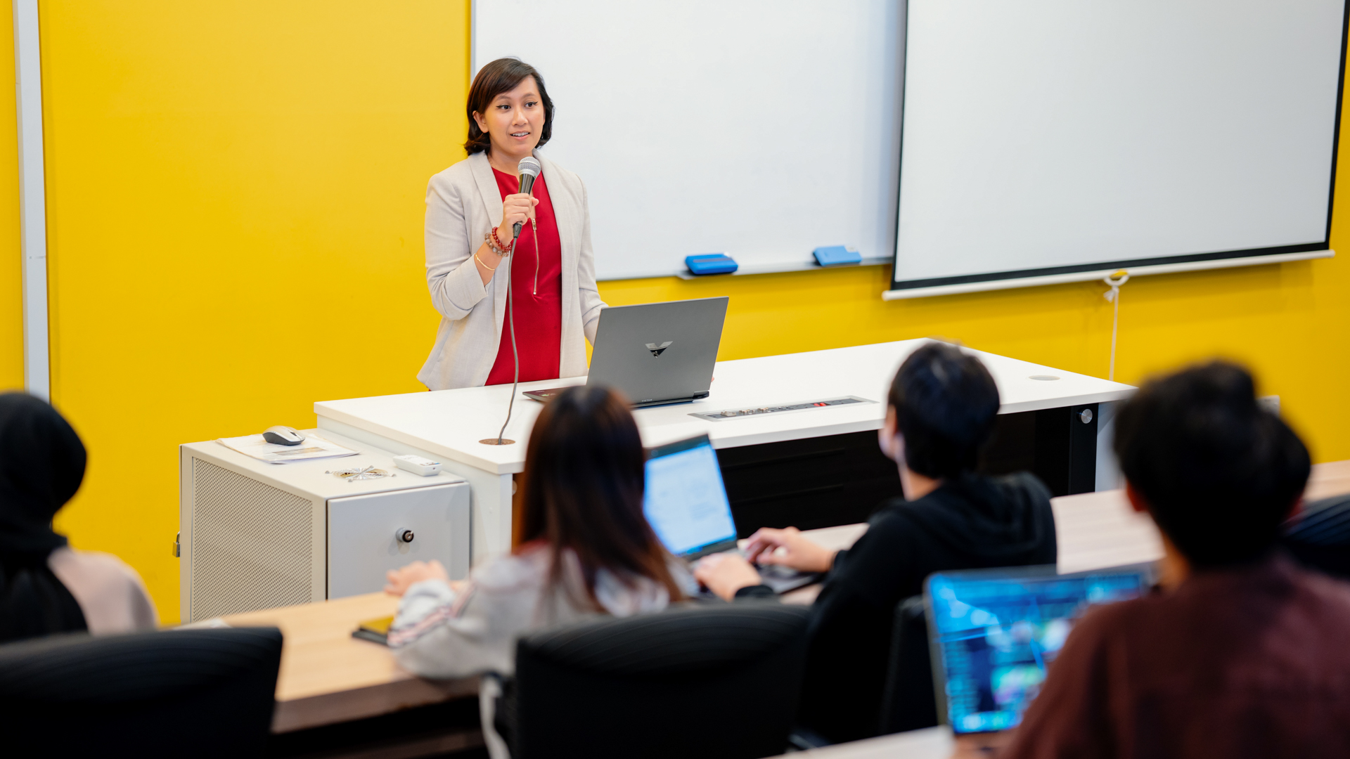 Taylor’s lecturer delivering an engaging classroom lecture to students